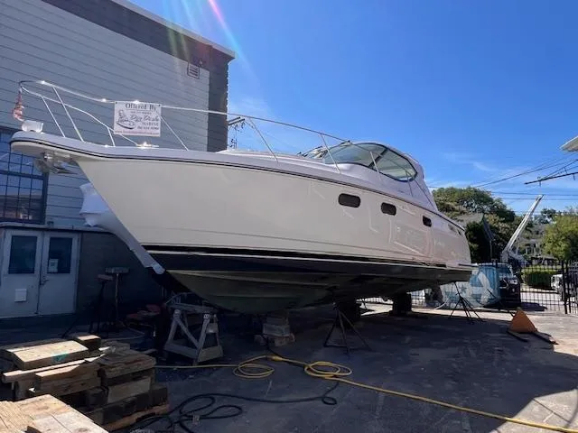 Private Dancer Yacht Photos Pics 2008 Tiara Yachts 3900 Sovran on dry dock, white hull, outdoor setting.