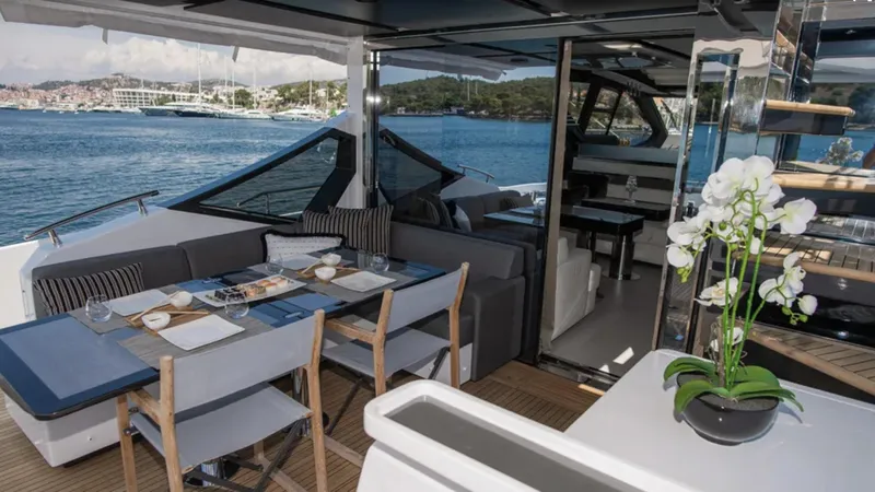  Yacht Photos Pics Luxurious 2018 Azimut S7 yacht interior with dining area and scenic ocean view.