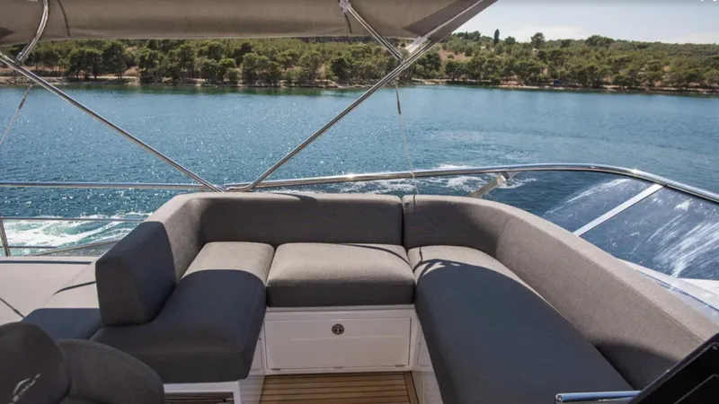  Yacht Photos Pics Luxurious seating area on 2018 Azimut S7 yacht with scenic ocean view.