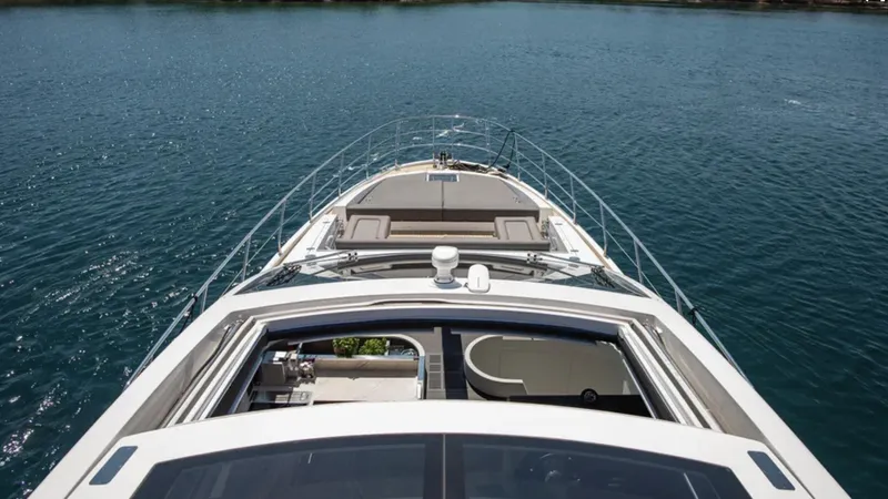  Yacht Photos Pics Azimut S7 2018 yacht on calm blue water, top deck view.
