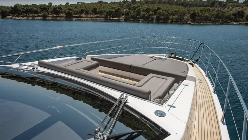  Yacht Photos Pics 2018 Azimut S7 yacht with spacious deck and seating, cruising on serene waters.