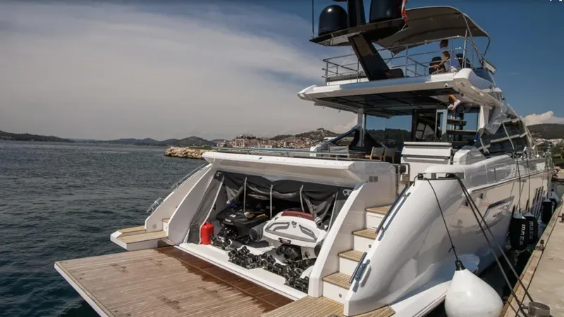  Yacht Photos Pics Azimut S7 2018 yacht docked, featuring a spacious deck and luxurious design.