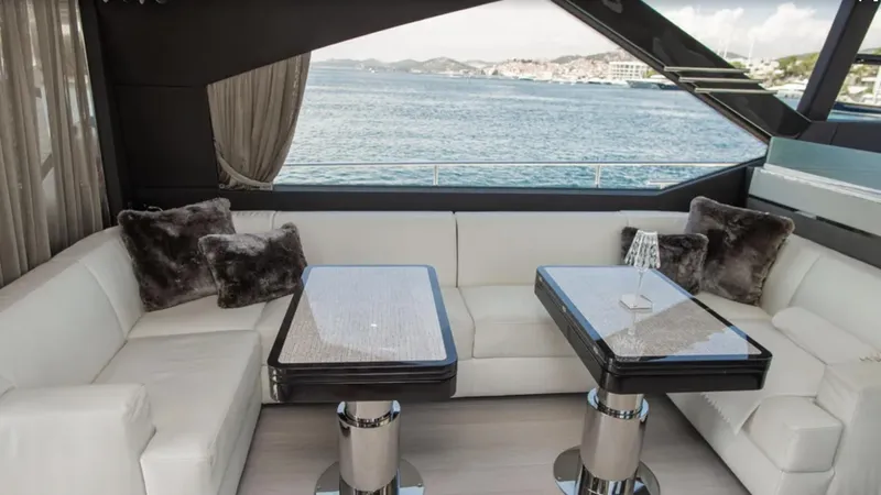  Yacht Photos Pics Luxurious interior of 2018 Azimut S7 yacht with elegant seating and ocean view.