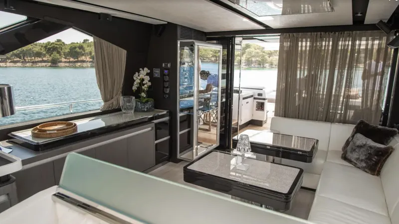  Yacht Photos Pics Luxurious interior of 2018 Azimut S7 yacht with modern furnishings and scenic water view.