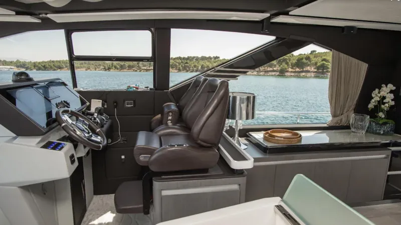  Yacht Photos Pics Interior of 2018 Azimut S7 yacht with luxurious seating and modern dashboard.