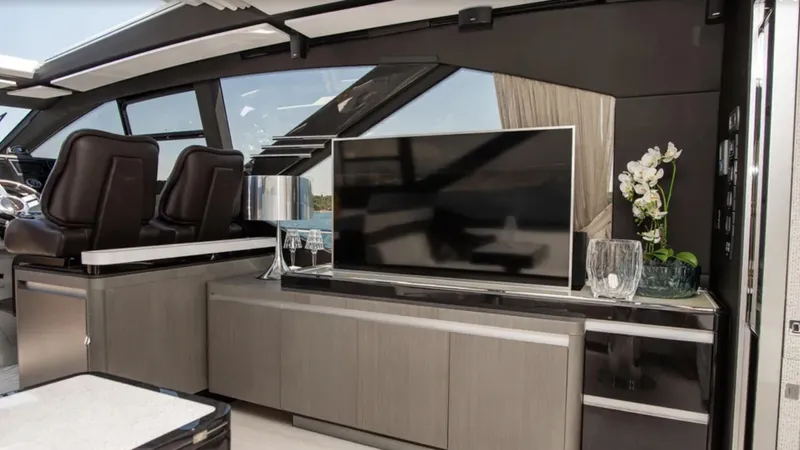  Yacht Photos Pics Luxurious interior of 2018 Azimut S7 yacht with modern TV and elegant decor.