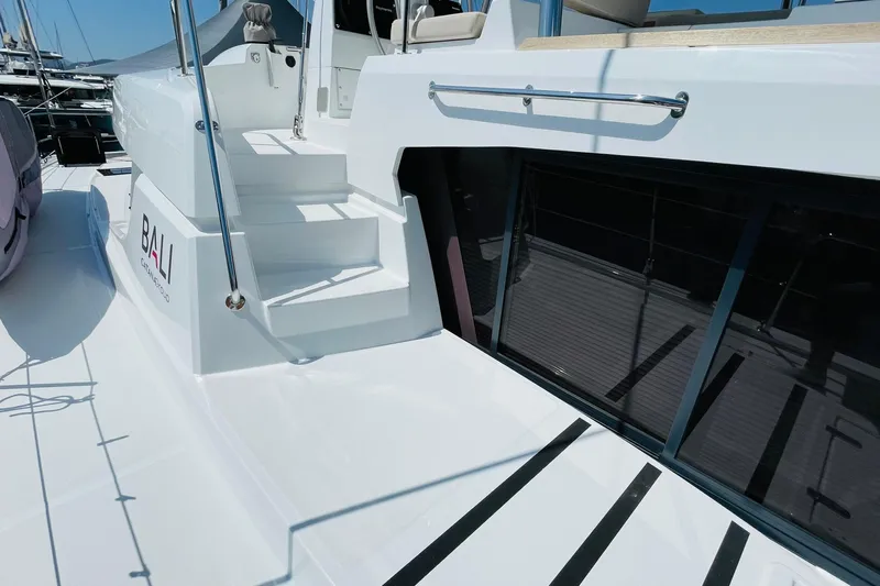  Yacht Photos Pics Modern Bali 4.6 catamaran, 2025 model, featuring sleek design and spacious deck area.