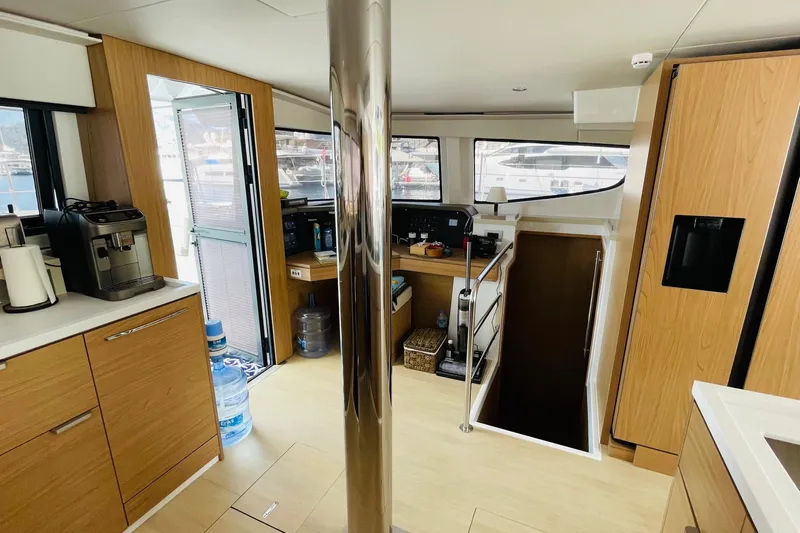  Yacht Photos Pics Modern interior of 2025 Bali 4.6 yacht with kitchen and navigation area.