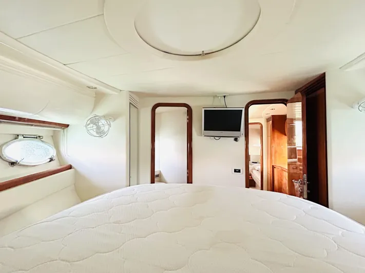  Yacht Photos Pics Luxurious interior of a 2006 Pershing 46 yacht with modern amenities.