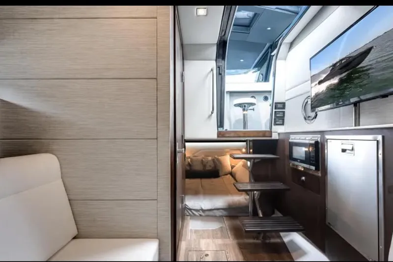  Yacht Photos Pics Luxurious interior of 2023 Cruisers 42 yacht with modern amenities and sleek design.