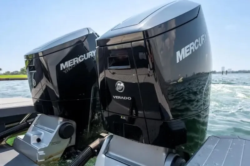  Yacht Photos Pics Twin Mercury Verado outboard engines on a 2023 Cruisers 42 boat, cruising on water.