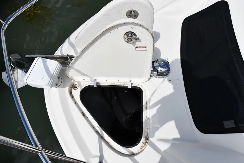Seriously Yacht Photos Pics Open hatch on 2005 Sea Ray 390 Motor Yacht deck, showing storage compartment.