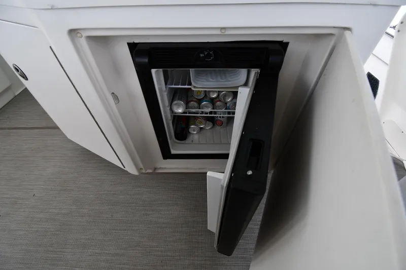 Seriously Yacht Photos Pics Mini fridge stocked with beverages on 2005 Sea Ray 390 Motor Yacht.