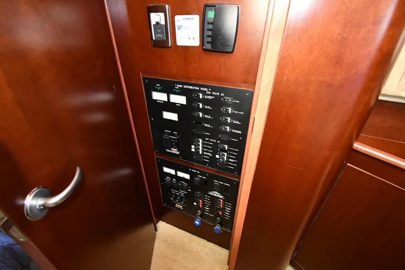 Seriously Yacht Photos Pics 2005 Sea Ray 390 Motor Yacht electrical control panel with wooden finish.