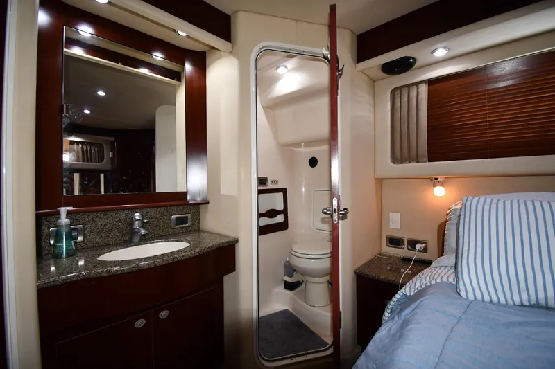 Seriously Yacht Photos Pics Luxurious 2005 Sea Ray 390 Motor Yacht interior with bathroom and cozy bedroom.