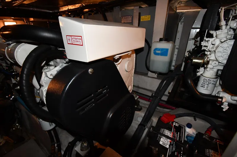 Seriously Yacht Photos Pics Engine room of 2005 Sea Ray 390 Motor Yacht with visible components and wiring.