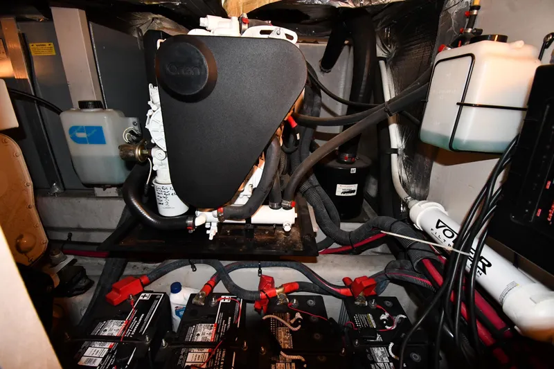 Seriously Yacht Photos Pics Engine room of 2005 Sea Ray 390 Motor Yacht with batteries and mechanical components.