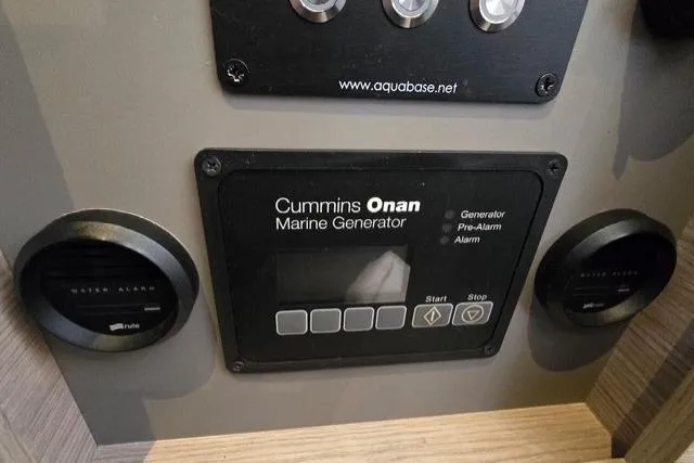 Island Nomad Yacht Photos Pics Control panel of Cummins Onan Marine Generator on 2022 Fountaine Pajot Tanna 47 yacht.