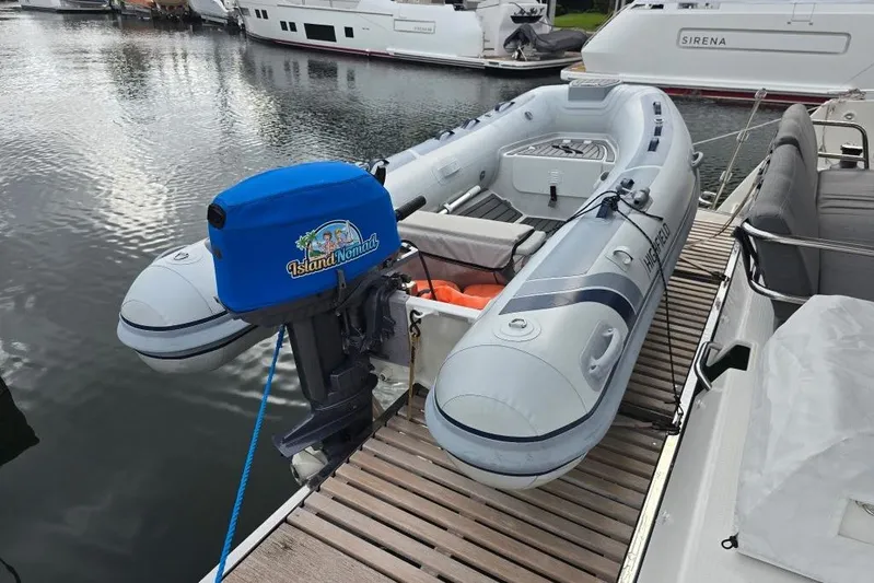 Island Nomad Yacht Photos Pics Inflatable boat with outboard motor on Fountaine Pajot Tanna 47, 2022 model.