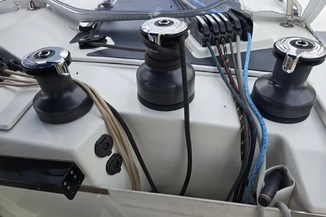 Island Nomad Yacht Photos Pics Winches and ropes on a 2022 Fountaine Pajot Tanna 47 catamaran deck.