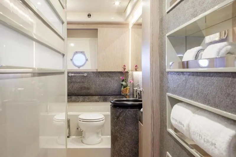 Matsu Yacht Photos Pics Luxurious bathroom interior of 2018 Ferretti Yachts 650, featuring modern amenities and elegant design.