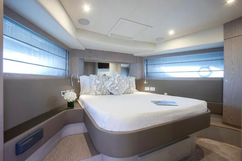 Matsu Yacht Photos Pics Luxurious bedroom interior of 2018 Ferretti Yachts 650 with modern design and ambient lighting.