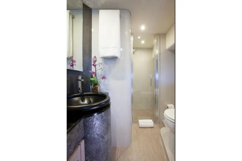 Matsu Yacht Photos Pics Luxurious bathroom in 2018 Ferretti Yachts 650, featuring modern fixtures and elegant design.