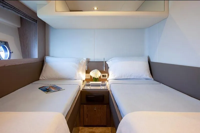 Matsu Yacht Photos Pics Luxurious twin cabin interior of 2018 Ferretti Yachts 650 with elegant decor.