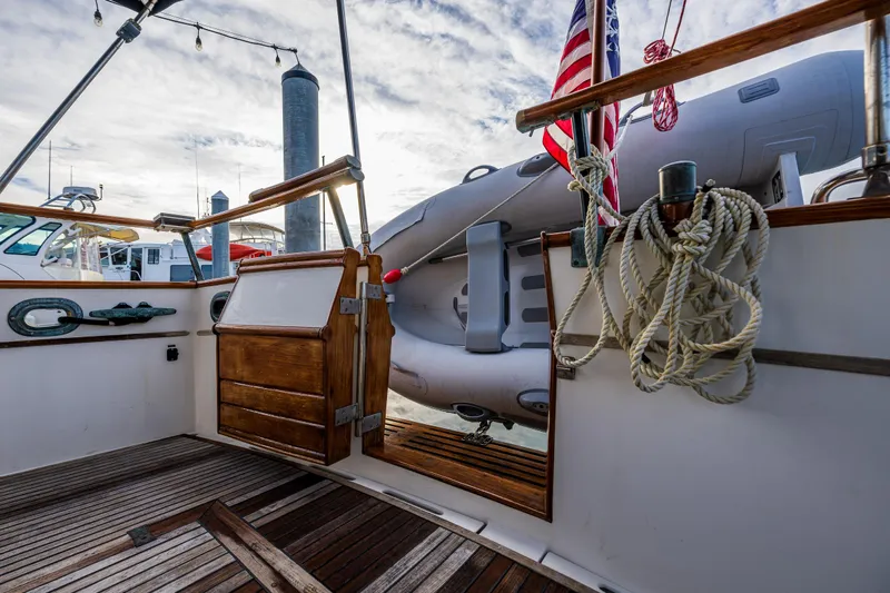 Skagit Song Yacht Photos Pics 1984 Grand Banks 36 Sedan boat deck with wooden finish and nautical ropes.