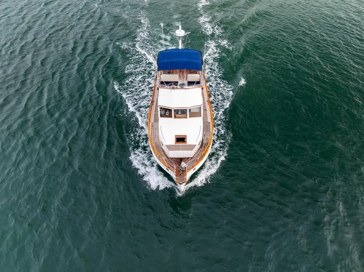 Skagit Song Yacht Photos Pics Aerial view of 1984 Grand Banks 36 Sedan cruising on open water.