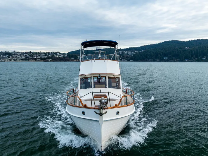 Skagit Song Yacht Photos Pics 1984 Grand Banks 36 Sedan cruising on open water, scenic background.