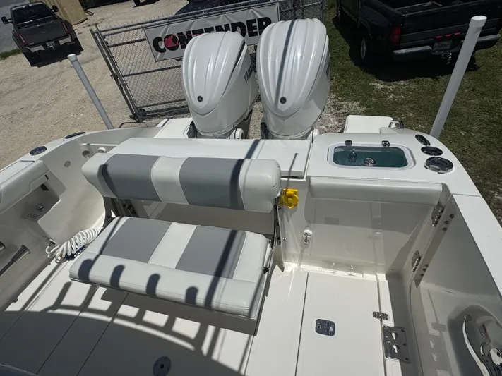  Yacht Photos Pics 2022 Pursuit S 288 Sport boat with dual engines and seating area.