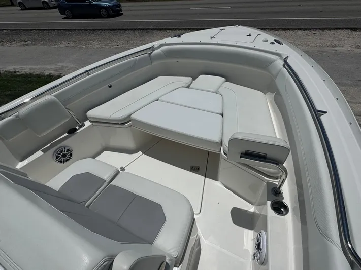  Yacht Photos Pics 2022 Pursuit S 288 Sport boat interior with white seating and cup holders.