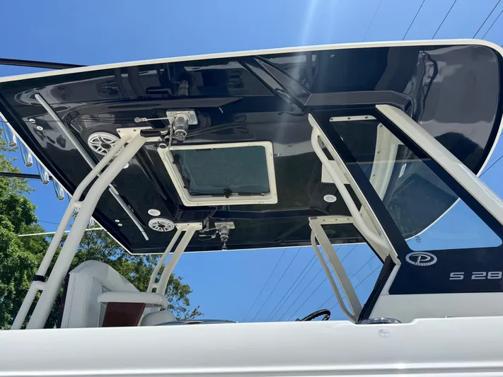  Yacht Photos Pics 2022 Pursuit S 288 Sport boat with sleek black T-top and modern design.