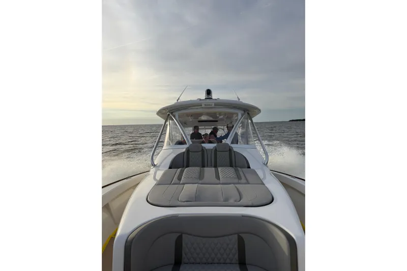 Kingston Grey Yacht Photos Pics 2026 Albemarle 45 Carolinian Fisharound Express cruising on open water.