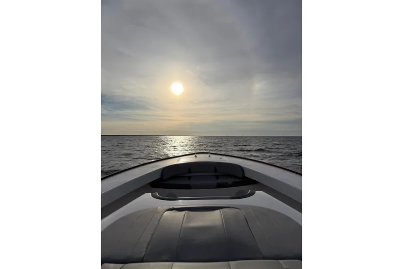 Kingston Grey Yacht Photos Pics Bow view of 2026 Albemarle 45 Carolinian Fisharound Express at sunset on open water.