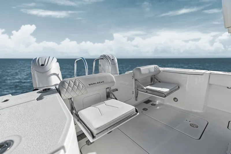  Yacht Photos Pics Manufacturer Provided Image: 2026 World Cat 265 DC-X boat interior with ocean view, featuring sleek seating and dual engines.