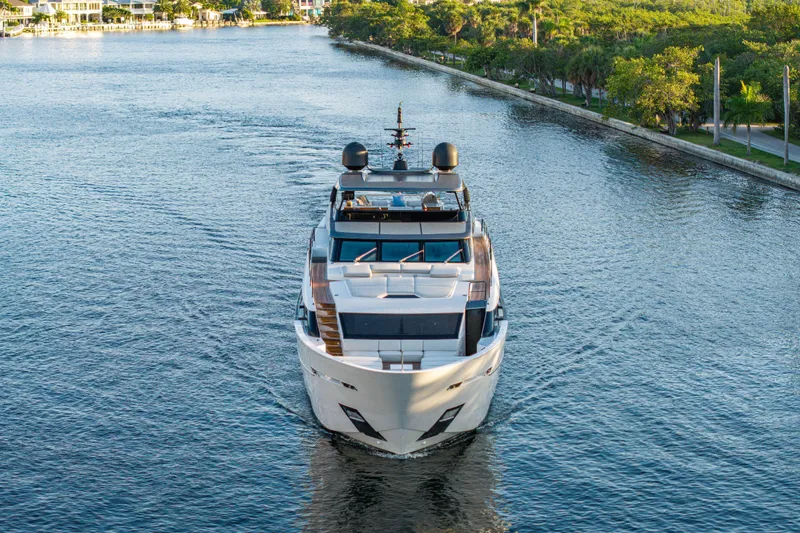 Sofi VI Yacht Photos Pics 2023 Sanlorenzo SL120A yacht cruising on a scenic waterway.