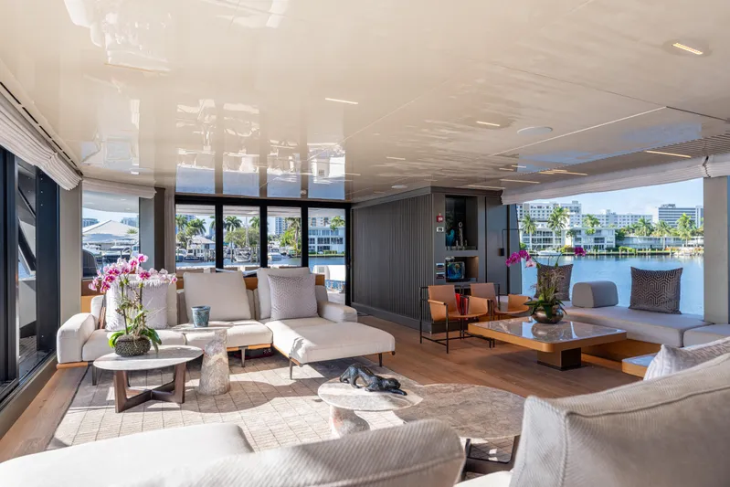 Sofi VI Yacht Photos Pics Luxurious interior of 2023 Sanlorenzo SL120A yacht with elegant furnishings and waterfront view.