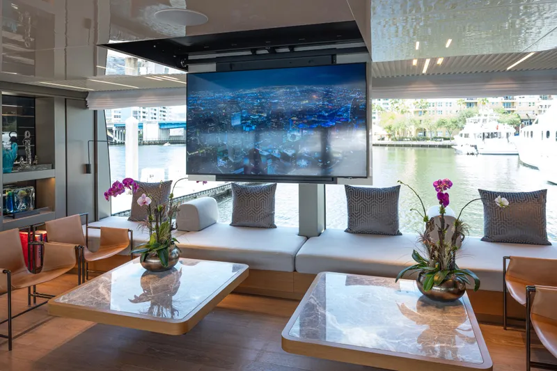 Sofi VI Yacht Photos Pics Luxurious 2023 Sanlorenzo SL120A yacht interior with modern decor and waterfront view.