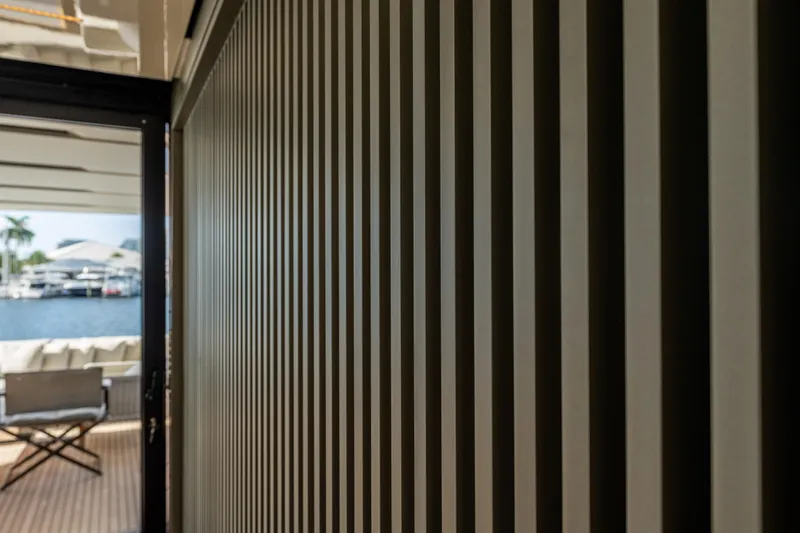 Sofi VI Yacht Photos Pics Interior view of 2023 Sanlorenzo SL120A yacht with modern striped wall design.