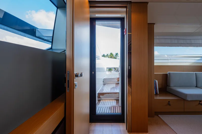 Sofi VI Yacht Photos Pics Interior view of 2023 Sanlorenzo SL120A yacht, featuring modern design and outdoor deck access.