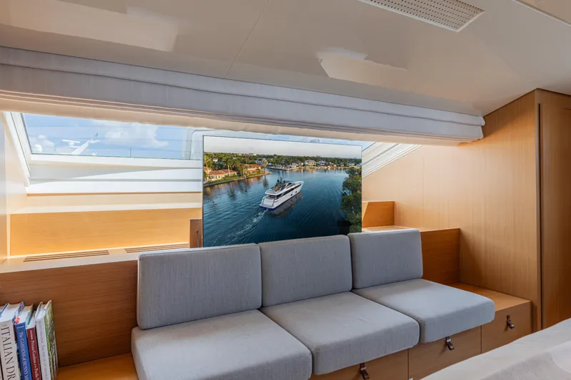 Sofi VI Yacht Photos Pics Luxurious interior of 2023 Sanlorenzo SL120A yacht with modern seating and scenic view.