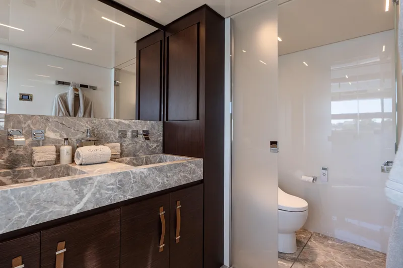 Sofi VI Yacht Photos Pics Luxurious bathroom in 2023 Sanlorenzo SL120A yacht with marble sink and modern fixtures.