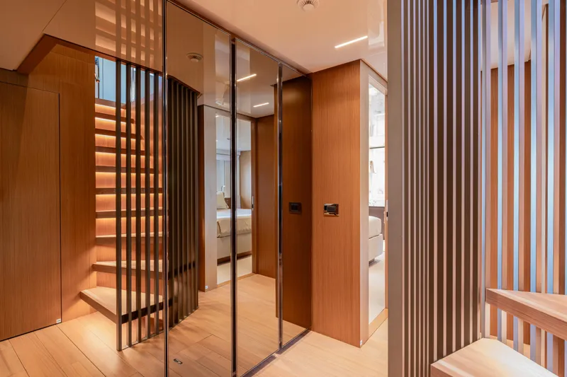 Sofi VI Yacht Photos Pics Luxurious interior of 2023 Sanlorenzo SL120A yacht with modern wood finishes and elegant design.