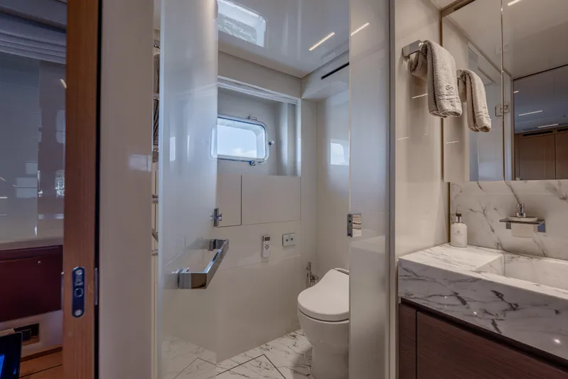 Sofi VI Yacht Photos Pics Luxurious bathroom on 2023 Sanlorenzo SL120A yacht with marble sink and modern fixtures.