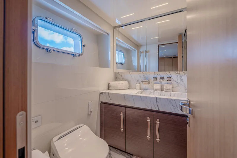 Sofi VI Yacht Photos Pics Luxurious bathroom on 2023 Sanlorenzo SL120A yacht with marble sink and modern fixtures.