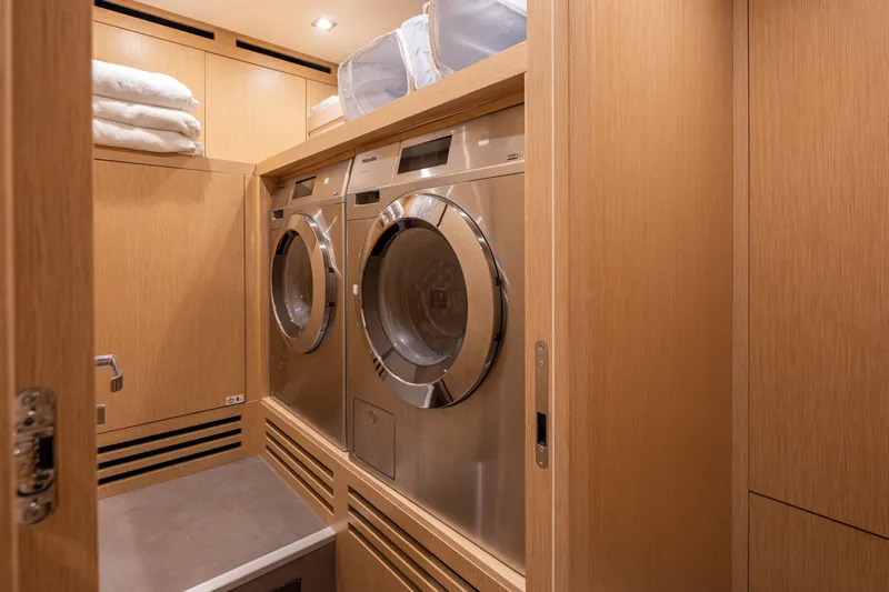 Sofi VI Yacht Photos Pics Laundry room with modern appliances on 2023 Sanlorenzo SL120A yacht.