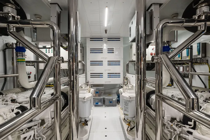 Sofi VI Yacht Photos Pics Engine room of 2023 Sanlorenzo SL120A yacht with polished metal and advanced machinery.