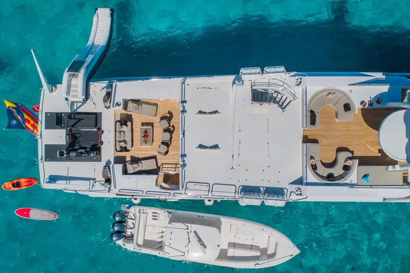 Starship Yacht Photos Pics Aerial view of 1986 Van Mill 144 Motor Yacht with deck seating and water slide.